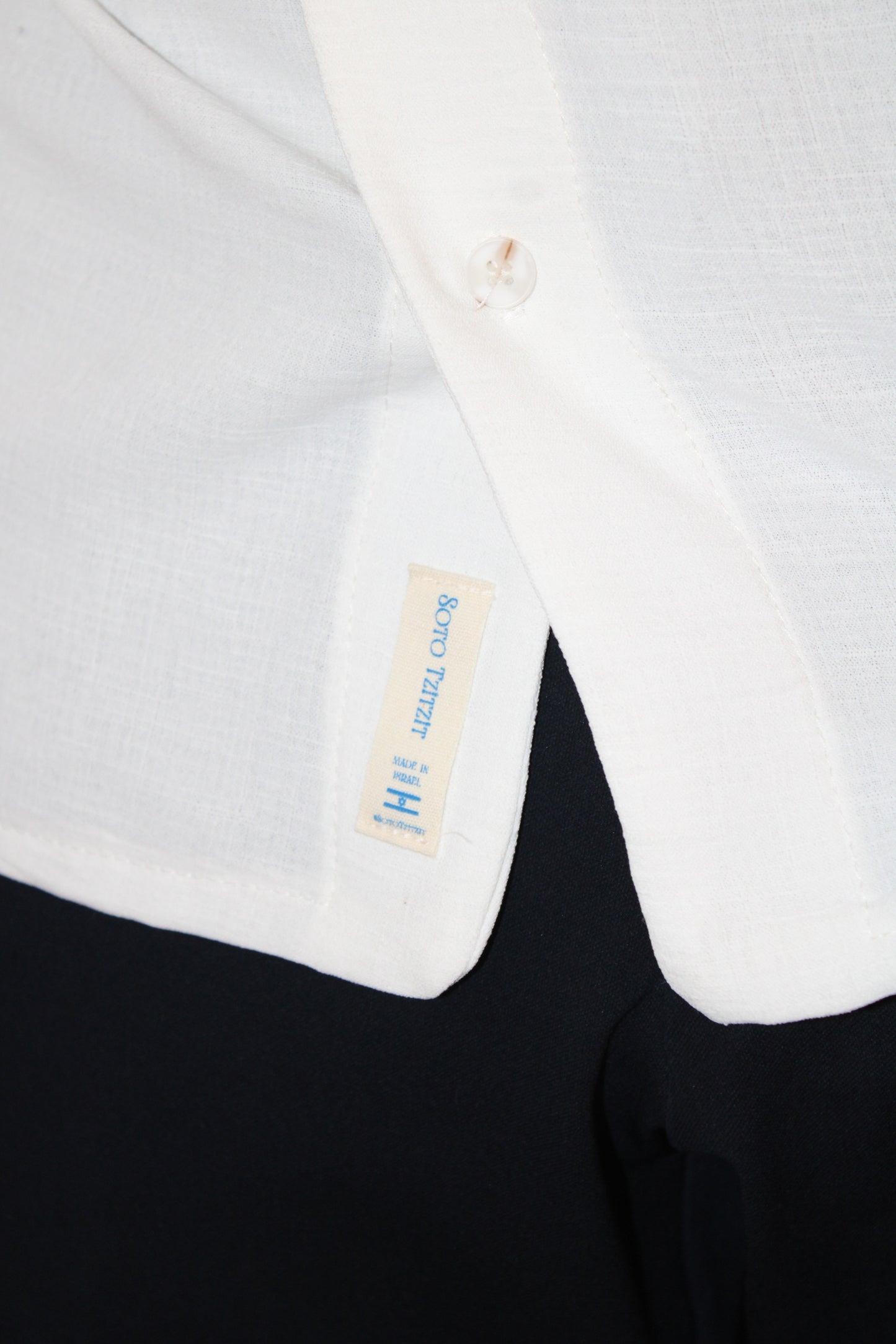 model wear buttoned Tzitzit White from front with closer look