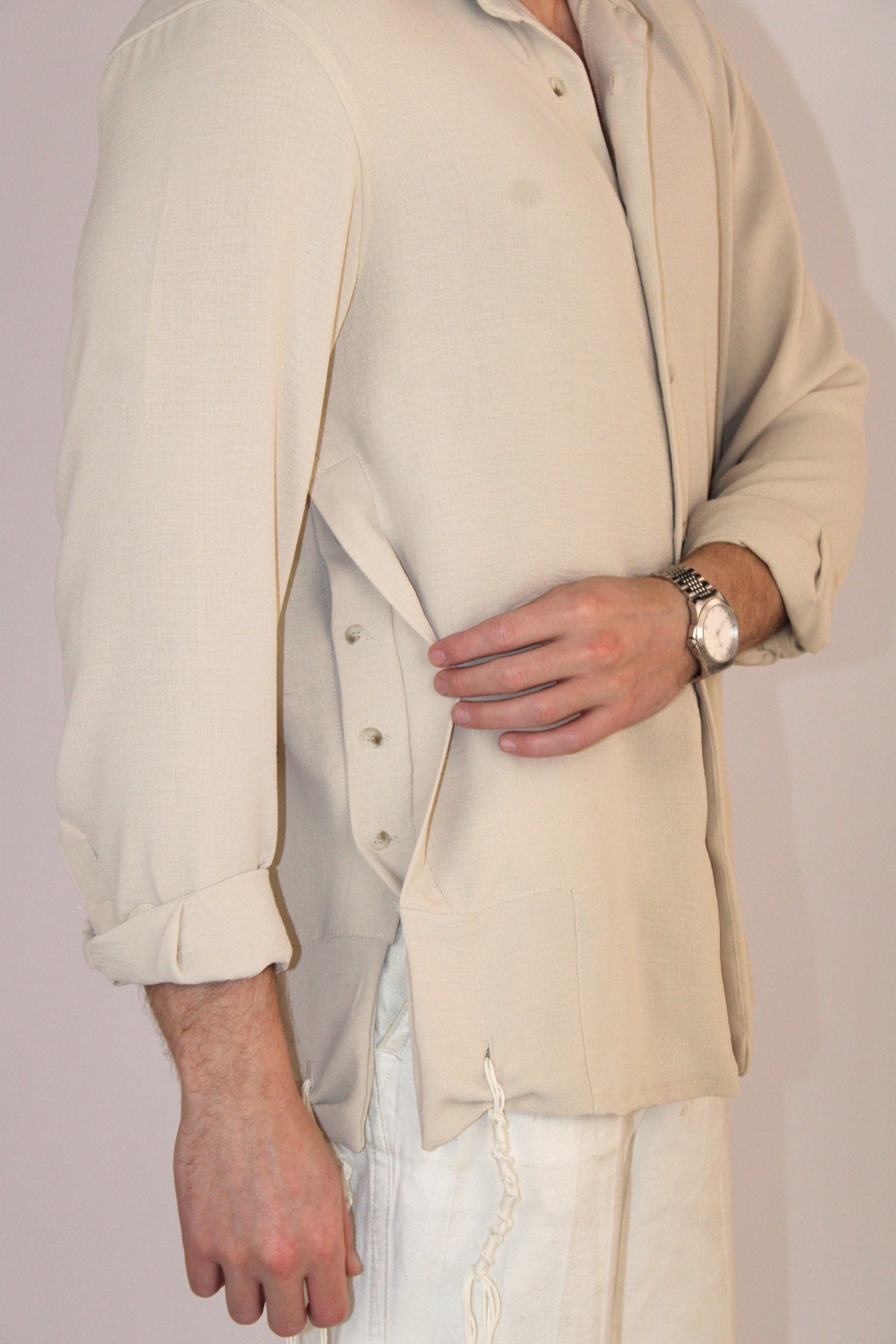 model wear buttoned Tzitzit Beige from side with closer look