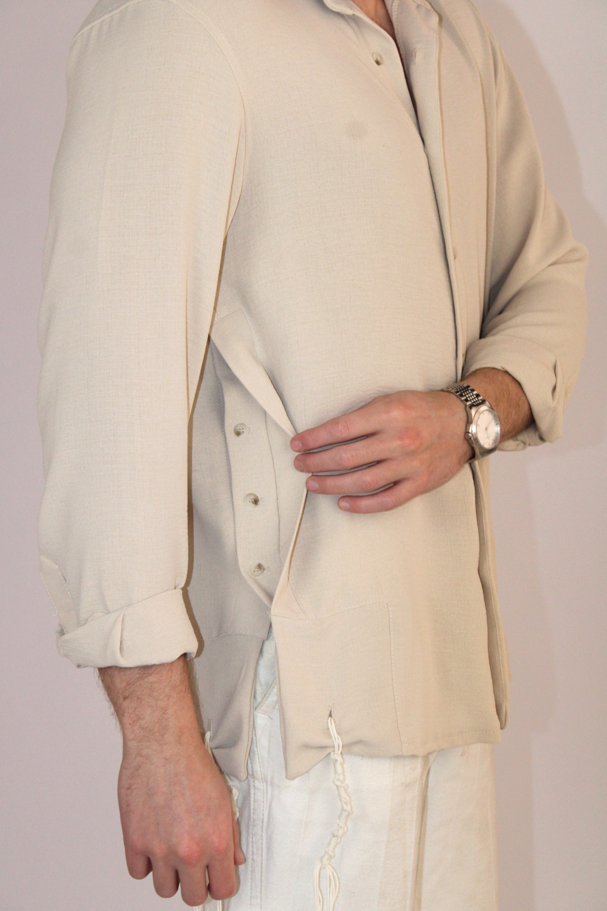 model wear buttoned Tzitzit Beige from side with closer look