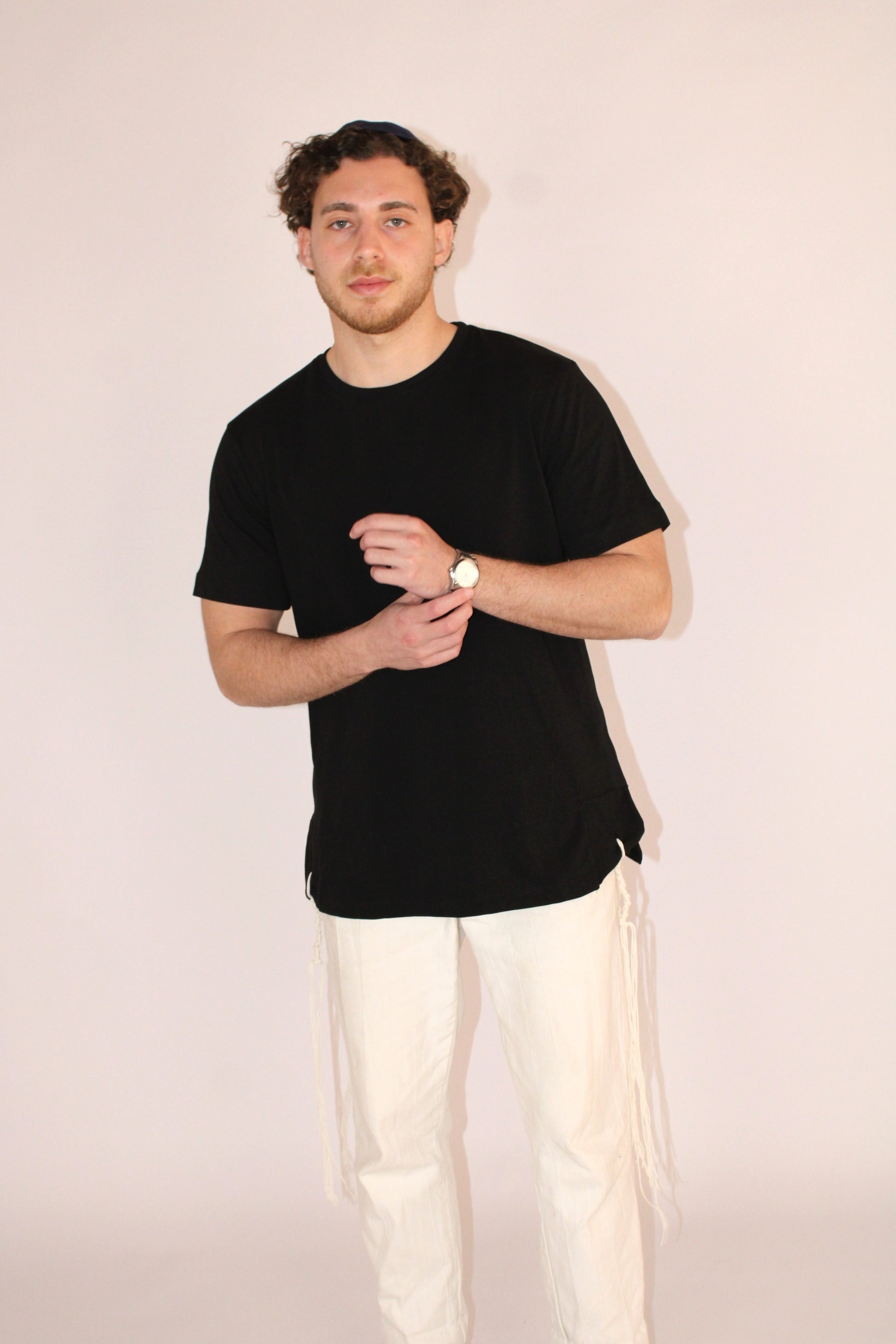 Model wears Classic Fit Black Tzitzit T-Shirt from Front with different pose