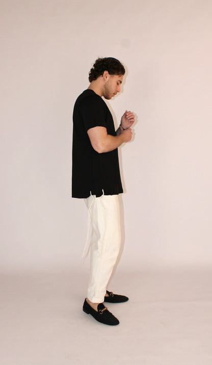 Model wears Classic Fit Charcoal Tzitzit T-Shirt from the right