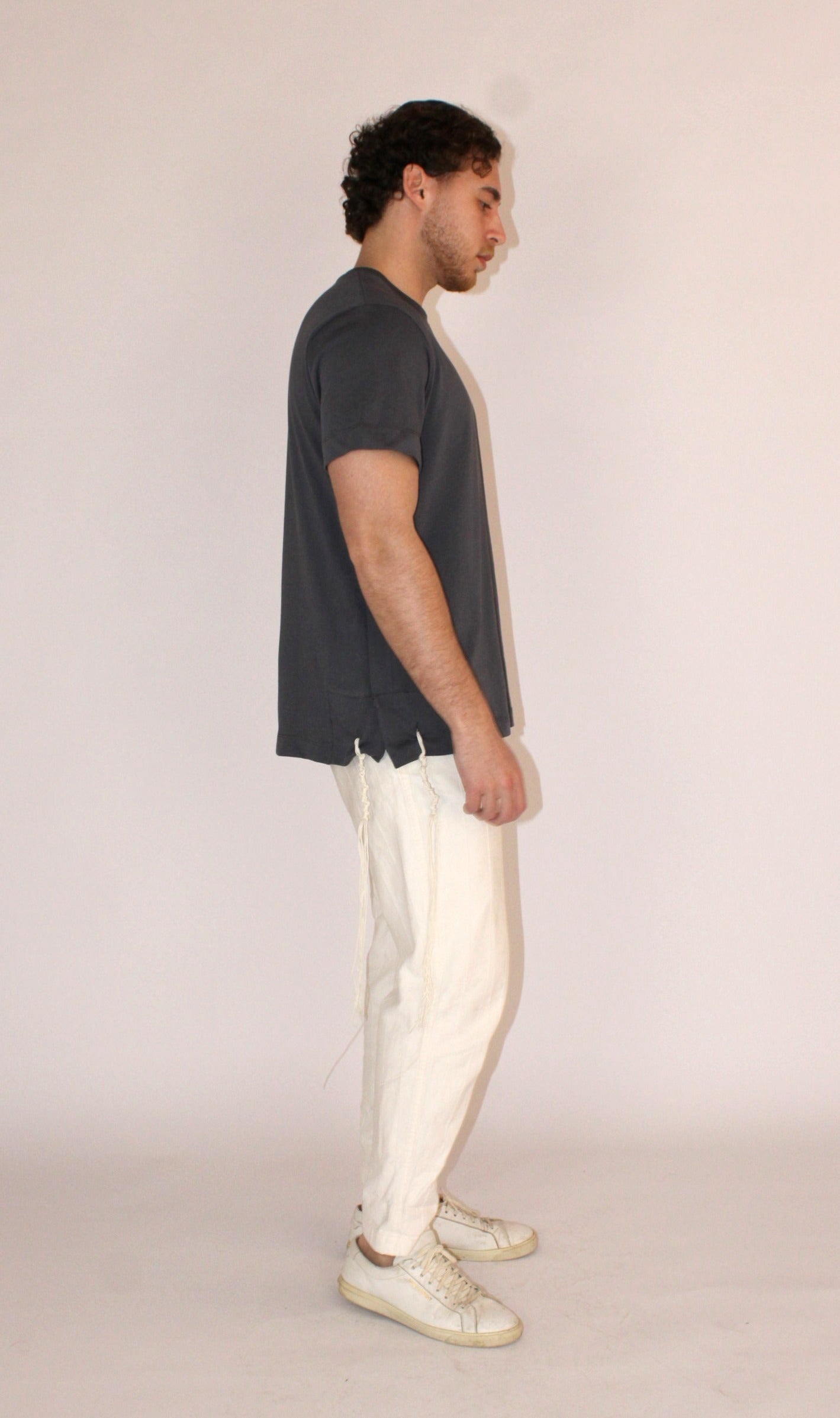 Model wears Classic Fit Charcoal Tzitzit T-Shirt from the right side
